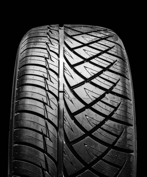 istock On-road tire tread isolated on black background 1456556447