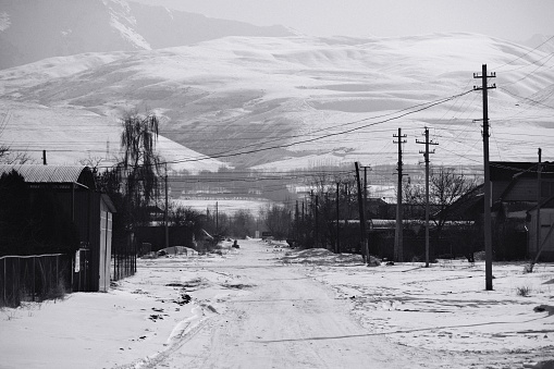 Mountain village street in winter