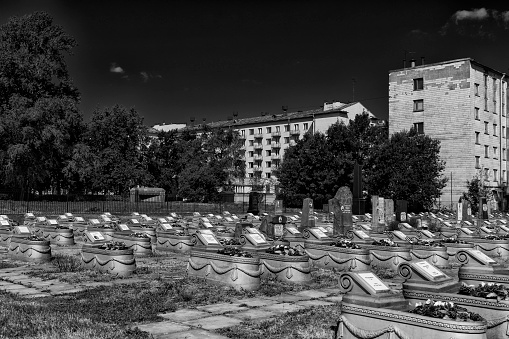 Saint Petersburg, Russia - July 18, 2021: Tombstones military cemetery of the Second World War in black and white style