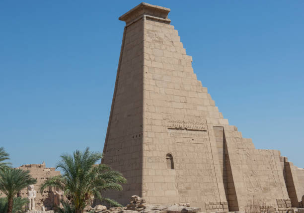 istock Ancient egyptian temple entrance wall with hieroglyphics 1456562452