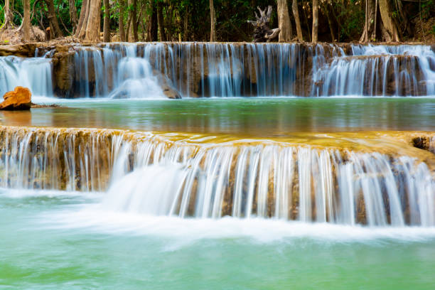istock Amazing colorful waterfall in national park forest during spring,beautiful deep forest in Thailand,technic long exposure, during vacation and relax time. 1456562490