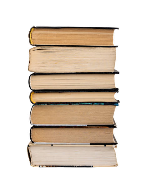 istock Old used books stack isolated on white background. Paper literature, classic novels 1456562757
