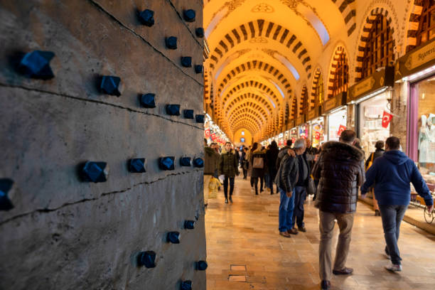 Istabul, Turkey - Mar 01, 2019: People shopping in the Grand Bazar in Istanbul, Turkey. Misir Carsisi. One of the large covered markets in the world.