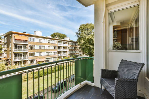 istock Narrow balcony with chair and door 1456565653