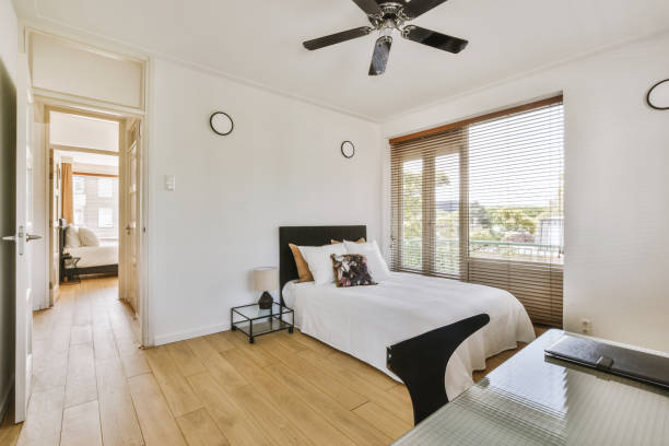 istock Light bedroom with wooden wardrobe 1456565860