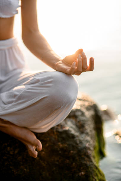 istock focus on female hand practicing yoga gyan mudra position 1456568595
