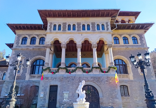 Busteni, Romania - December 31, 2022: The welcome sign to Cantacuzino Castle or Nevermore Academy - the place where the Wednesday series film was filmed