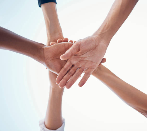 istock Together, business hands and teamwork circle for community support, team building and career collaboration. Group of people hand stack sign for mission, trust and goal with below mock up background 1456570279
