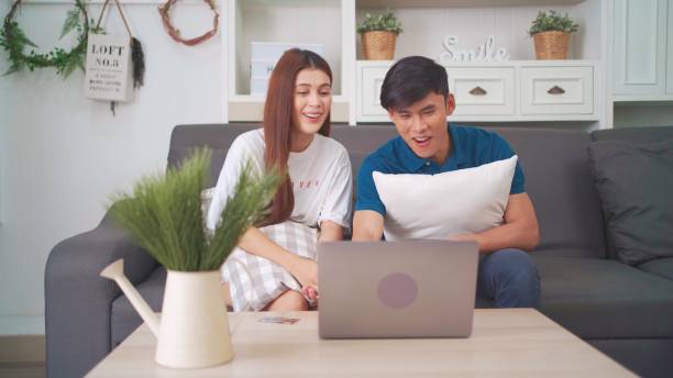 istock Couple shopping online. 1456571222