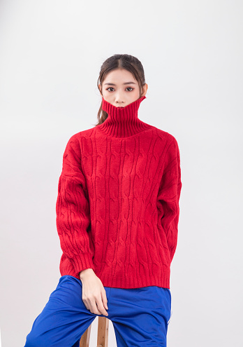 Beautiful woman in red sweater