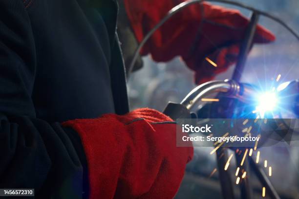 Closeup Of A Welder At A Factory Making Metal Structures Stock Photo - Download Image Now