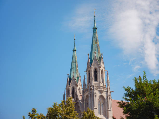 Catholic Church Paul in neo-gothic style with a tall tower and an observation deck open during Beer Fest. Munich, Germany