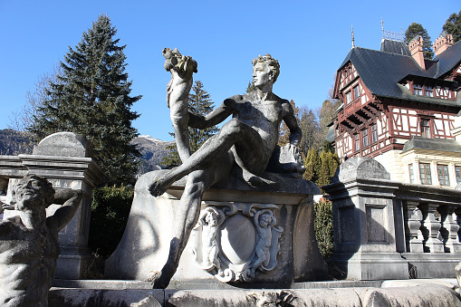 Sinaia, Romania - December 31, 2022: Peles castle Sinaia in winter season, Transylvania, Romania protected by Unesco World Heritage Site