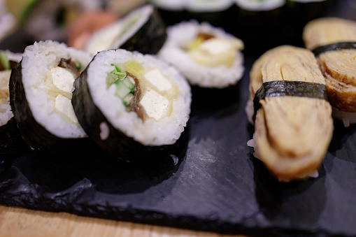 fresh Japanese food with chopstick on a table at a restaurant