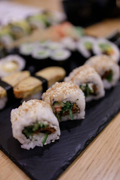 fresh Japanese food with chopstick on a table at a restaurant