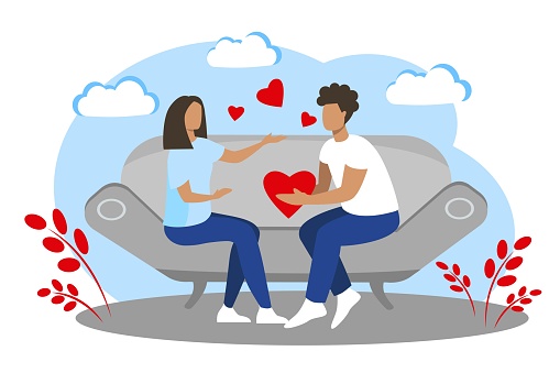 Man and woman sitting on sofa. A romantic date. Valentine's day. The relationship between a man and a woman.