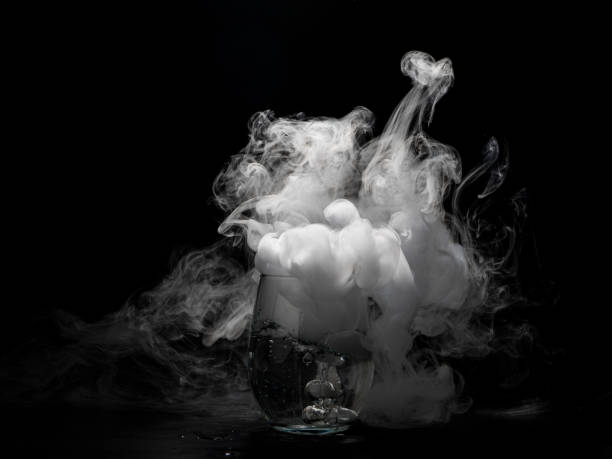istock molecular cuisine. Glass with dry ice and steam 1456576877