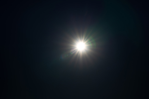 Real lens flare isolated on black background