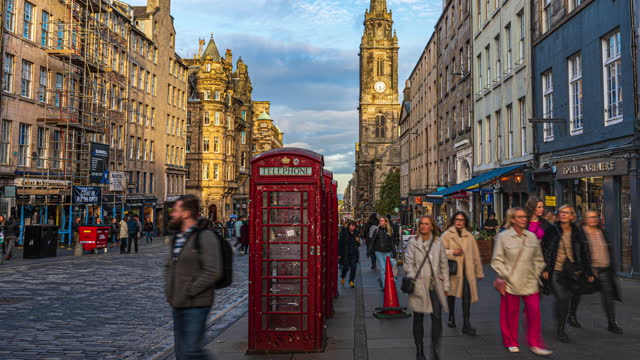 Time lapse of Crowded Commuter People and Tourist walking and traveling around high street,old town Edinburgh, Scotland, United Kingdom