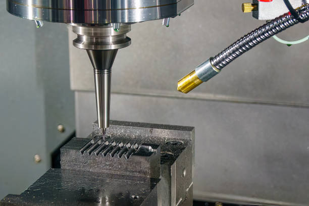 istock The CNC milling machine cutting injection mold part by solid ball end mill tool. 1456581525