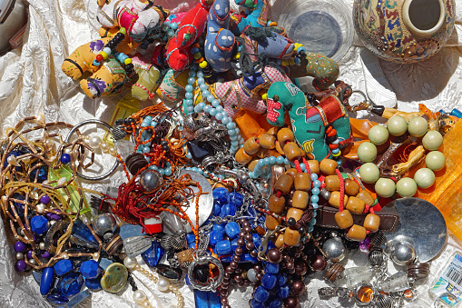 Athens, Greece - May 03, 2015: Vintage toys and retro style bracelets bijoux at Monastiraki flea market.