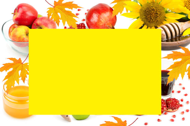 Honey, apples and pomegranate seeds isolated on white background. Greeting card for rosh hashanah. Free space for text.