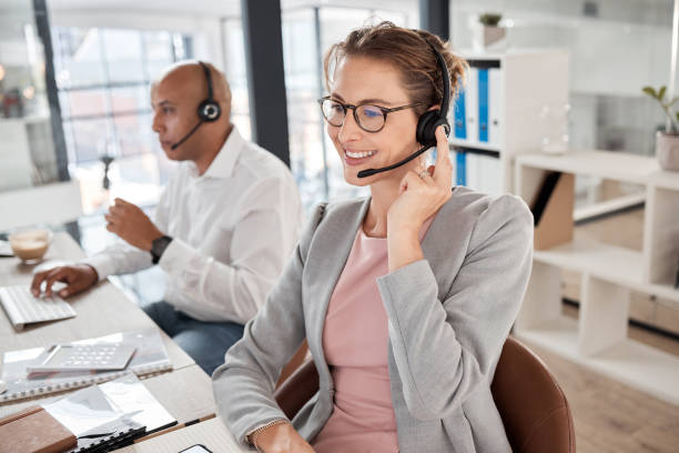 istock Call center, support and worker consulting, talking and giving customer service online for telemarketing. Crm, contact us and happy employee in technical support at a corporate communication agency 1456583877
