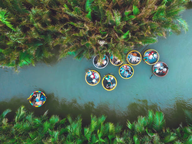 drone view on colorful roundboats  on lagoon in hoi an, vietnam stock photo