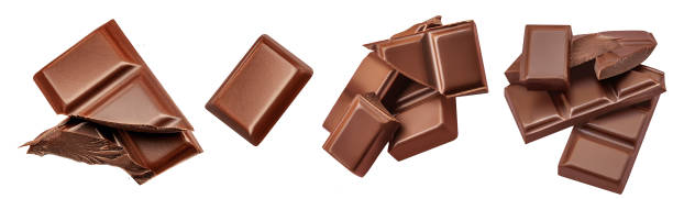 istock Dark chocolate chunks isolated on white background. Collection. Broken Chocolate pieces closeup 1456585442