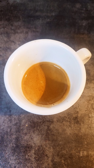 espresso coffee in a white cup