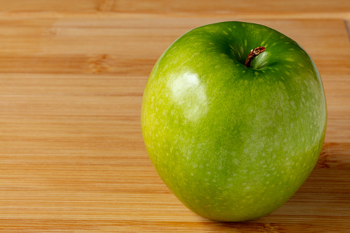 Granny Smith Apple on Cutting Board Right Side