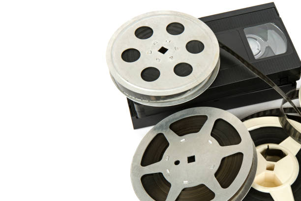 istock Film reel and videocassette isolated on white background. Free space for text. 1456586580