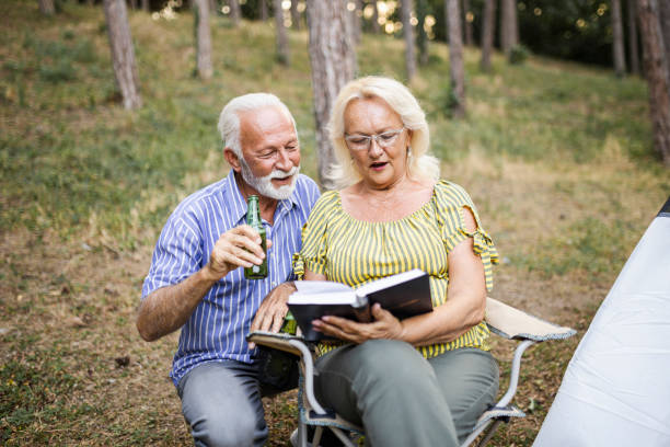 istock Senior couple enjoying  on the camping 1456587020