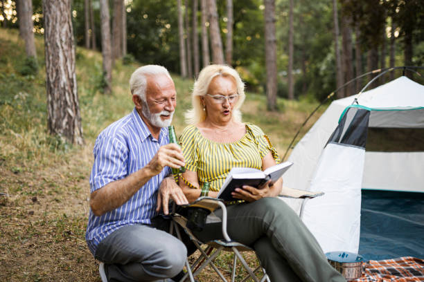 istock Senior couple enjoying  on the camping 1456587164