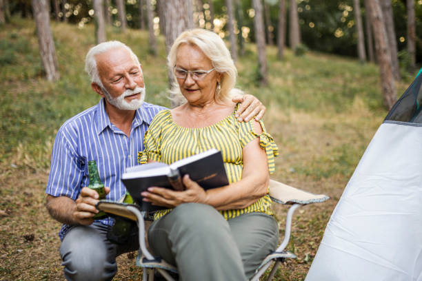 istock Senior couple enjoying  on the camping 1456587173