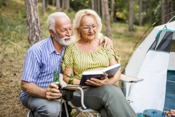 istock Senior couple enjoying  on the camping 1456587278