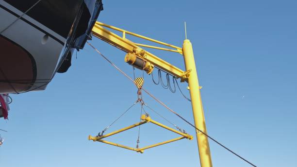 istock Port Cargo Loading Crane Lift Gantry in Fishing Harbor 1456588362