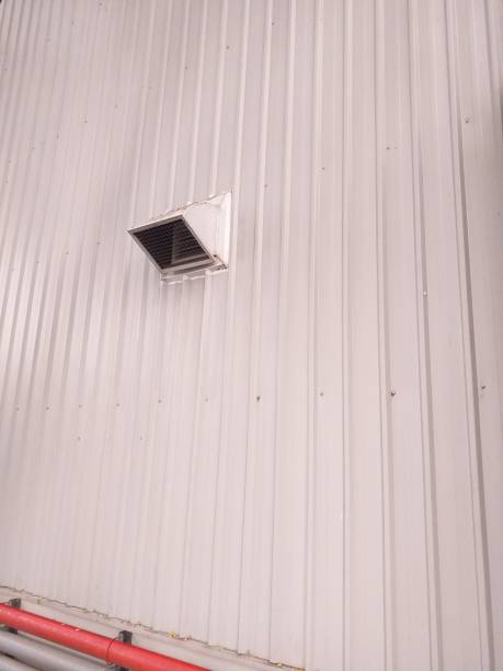 istock Air Ventilation duct on metal corrugated wall 1456598547