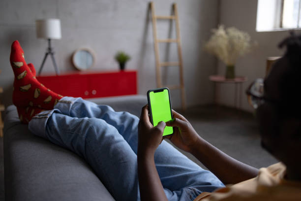 istock African American man using a smart phone at home 1456601582