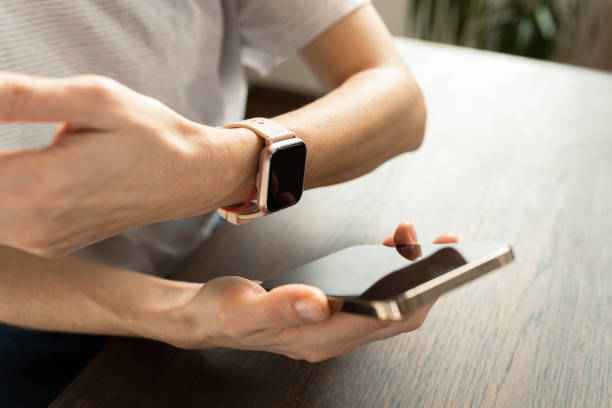 istock Happy woman using smartphone at home 1456604481