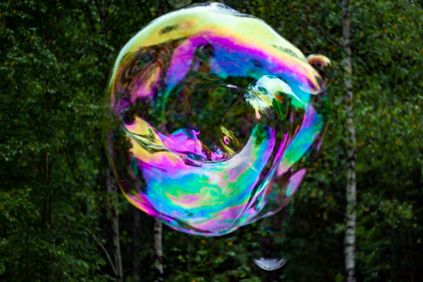 istock Big bubble on street. Thin soap film. Soap balloon. 1456604646