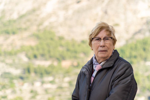 istock senior woman sad 1456604715