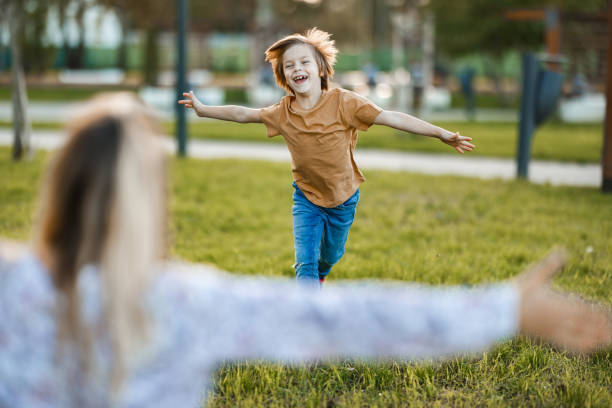 istock Boy running toward his mom 1456605424