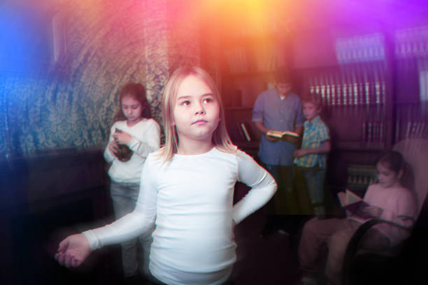 istock Positive girl is thinking about solving the problem in quest room 1456606146