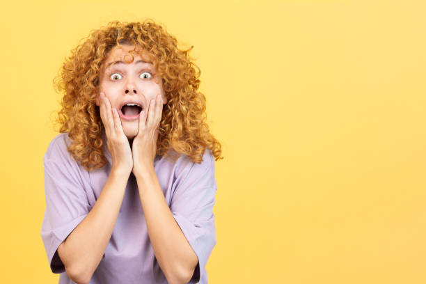 istock Woman with the hands on the face expressing dismay 1456606246