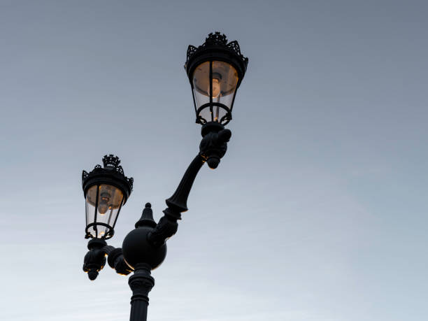 istock Double streetlights on sky background, minimalist image 1456606811