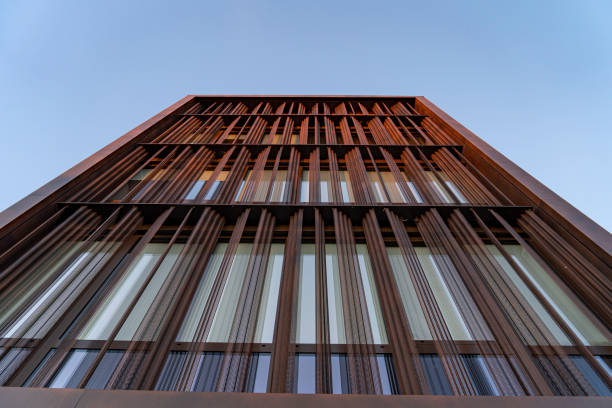 istock Facade perspective of modern building on blue sky, chateauroux, Balsan Campus 1456606815