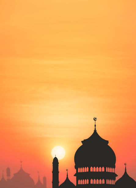 istock Silhouette Mosque dome with blurred beautiful Sunset Sky Background in Vertical frame 1456607045