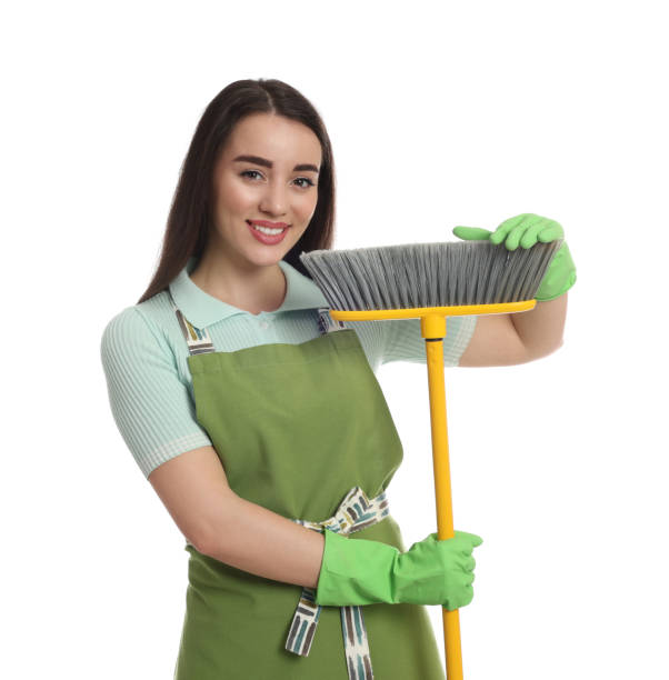 istock Beautiful young woman with broom on white background 1456609863