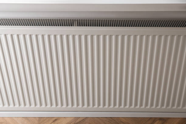 istock Closeup view of modern panel radiator indoors 1456611891